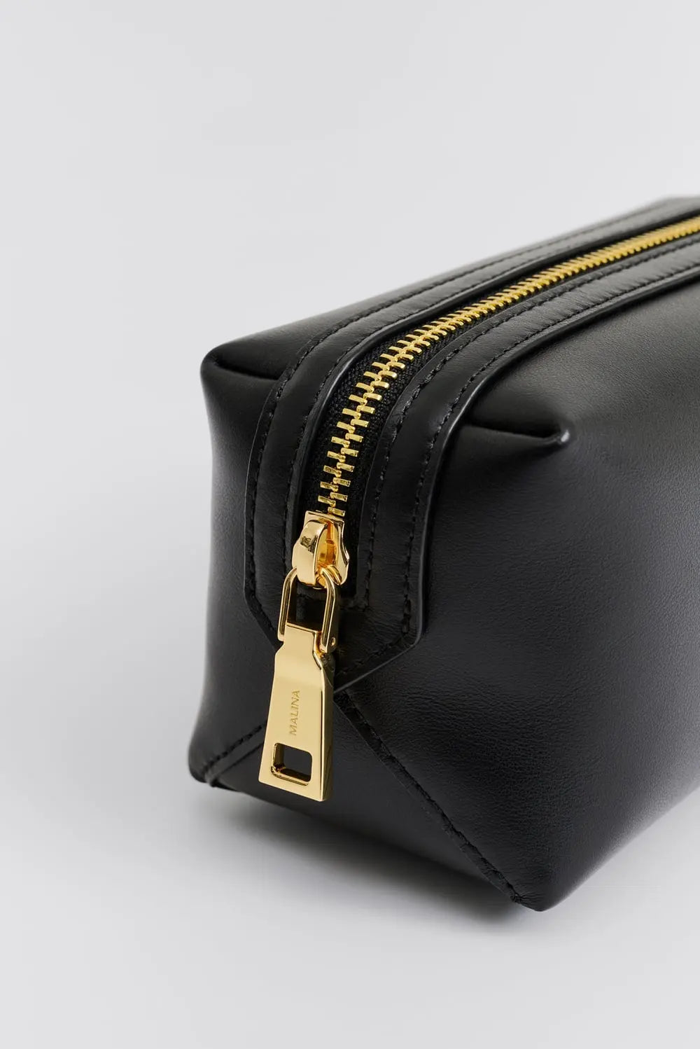 MONOGRAM KULTURBEUTEL Monogram Kulturbeutel aus Leder